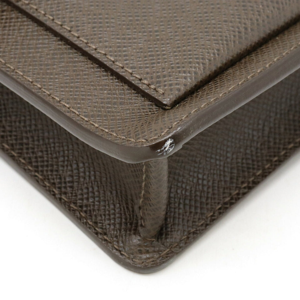 Louis Vuitton Selenga  Leather Clutch Bag