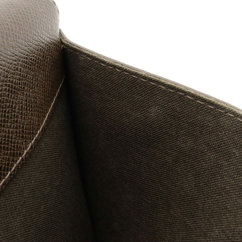 Louis Vuitton Selenga  Leather Clutch Bag