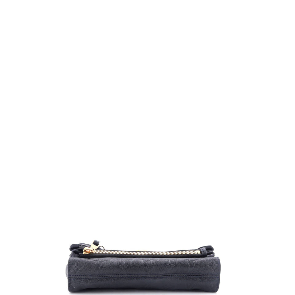 Petillante Clutch Monogram Empreinte Leather