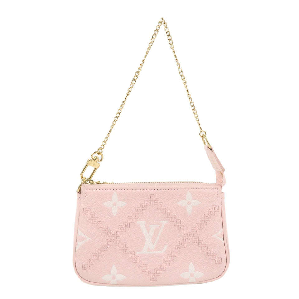 Louis Vuitton Monogram Empreinte Mini Pochette Accessoire M81140