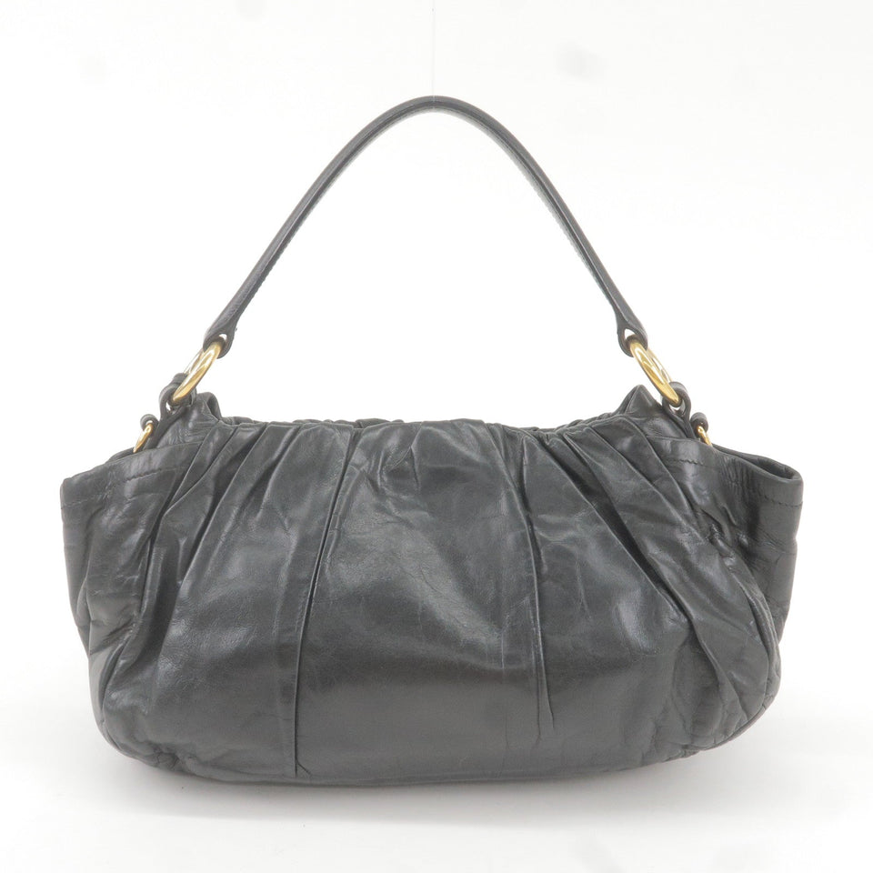 Prada Logo Leather Shoulder Bag With Tassel Black