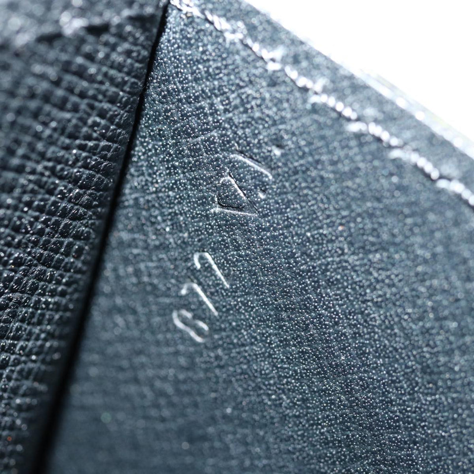 Louis Vuitton Montaigne  Leather Clutch Bag