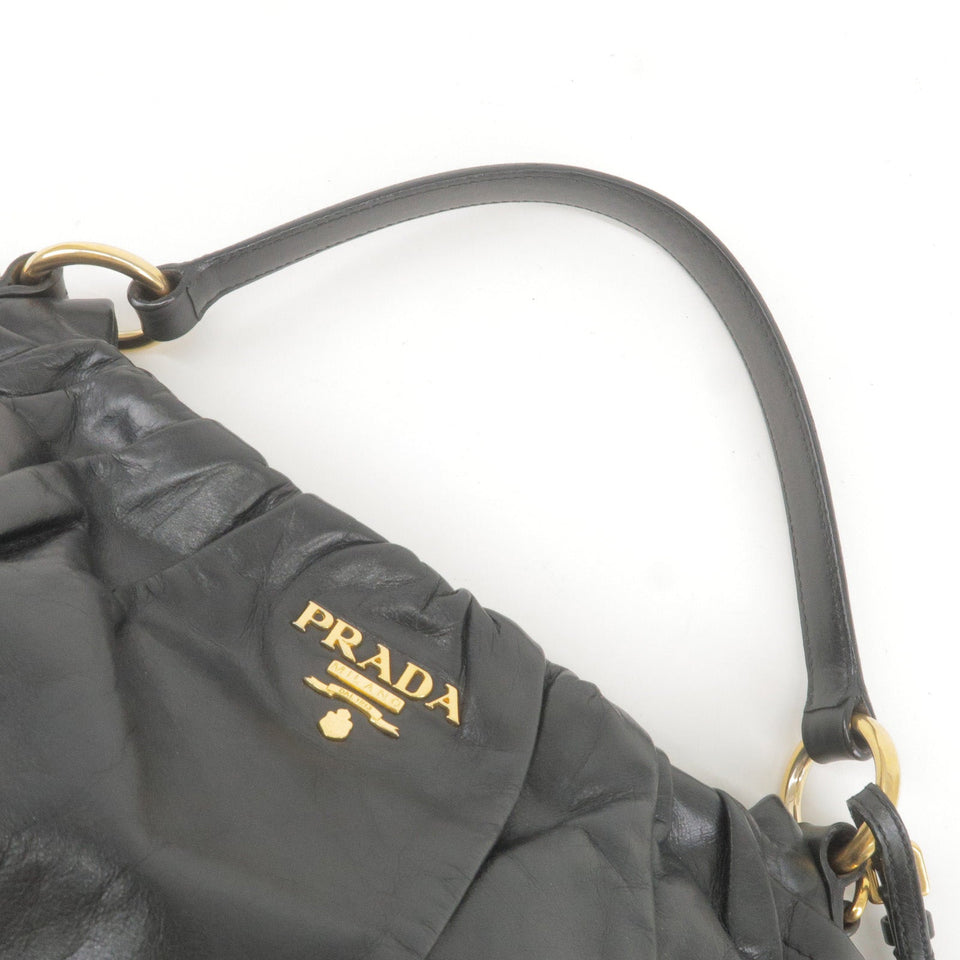 Prada Logo Leather Shoulder Bag With Tassel Black