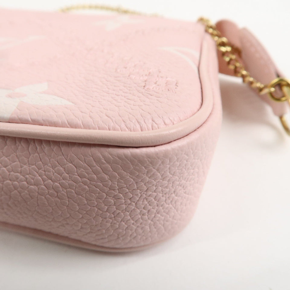 Louis Vuitton Monogram Empreinte Mini Pochette Accessoire M81140