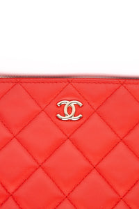 CHANEL Coral Lambskin Quilted Medium O Case Clutch