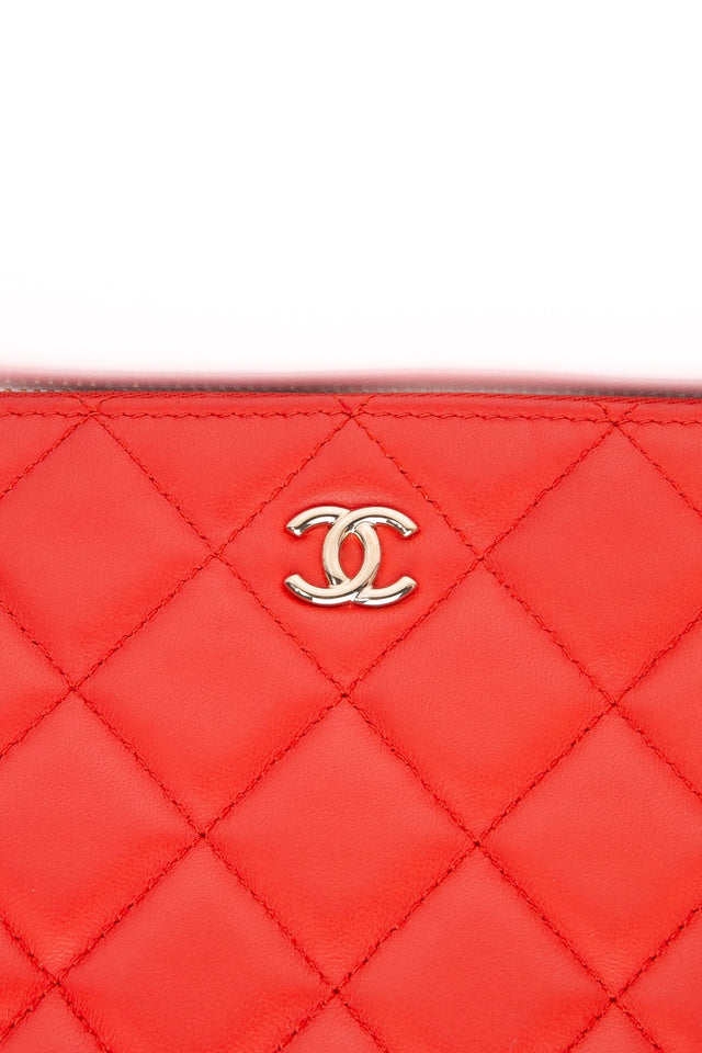 CHANEL Coral Lambskin Quilted Medium O Case Clutch