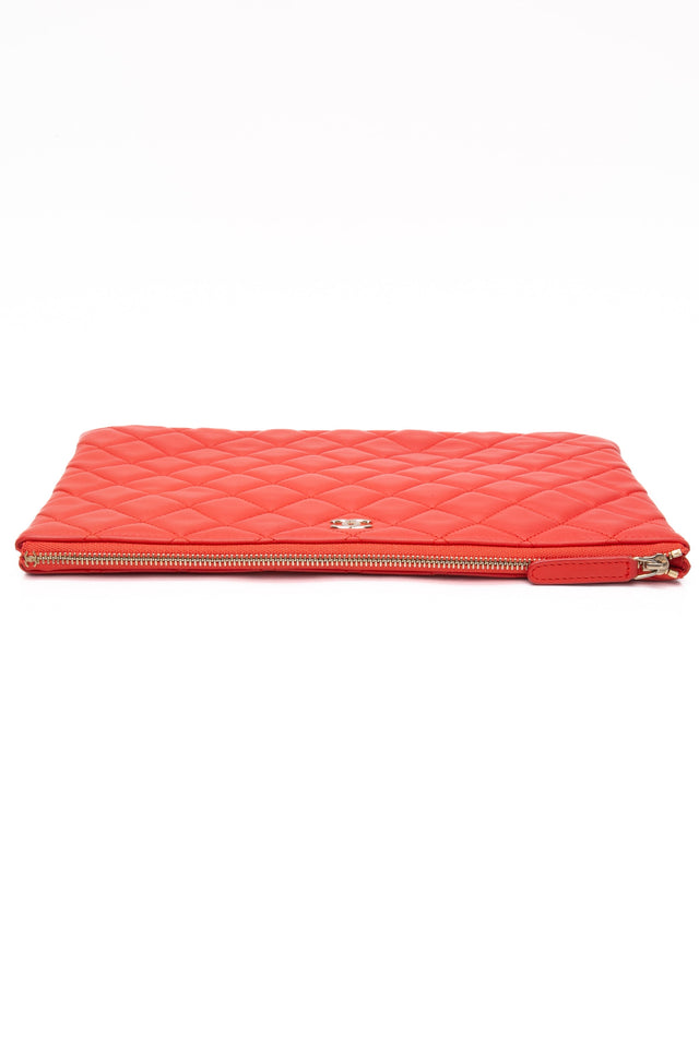 CHANEL Coral Lambskin Quilted Medium O Case Clutch