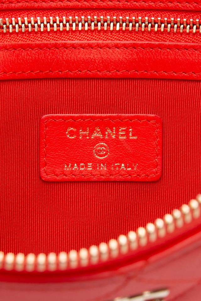 CHANEL Coral Lambskin Quilted Medium O Case Clutch