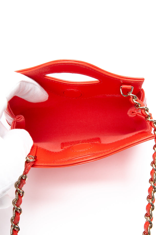 CHANEL Coral Red Shiny Lambskin Quilted Mini 31 Clutch with Chain (New)