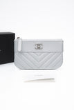 CHANEL Metallic Silver Caviar Chevron Quilted Small Mademoiselle Zip Pouch Case