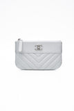 CHANEL Metallic Silver Caviar Chevron Quilted Small Mademoiselle Zip Pouch Case
