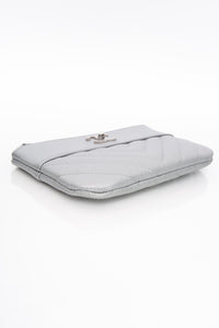 CHANEL Metallic Silver Caviar Chevron Quilted Small Mademoiselle Zip Pouch Case