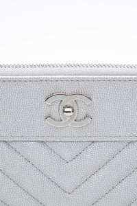CHANEL Metallic Silver Caviar Chevron Quilted Small Mademoiselle Zip Pouch Case