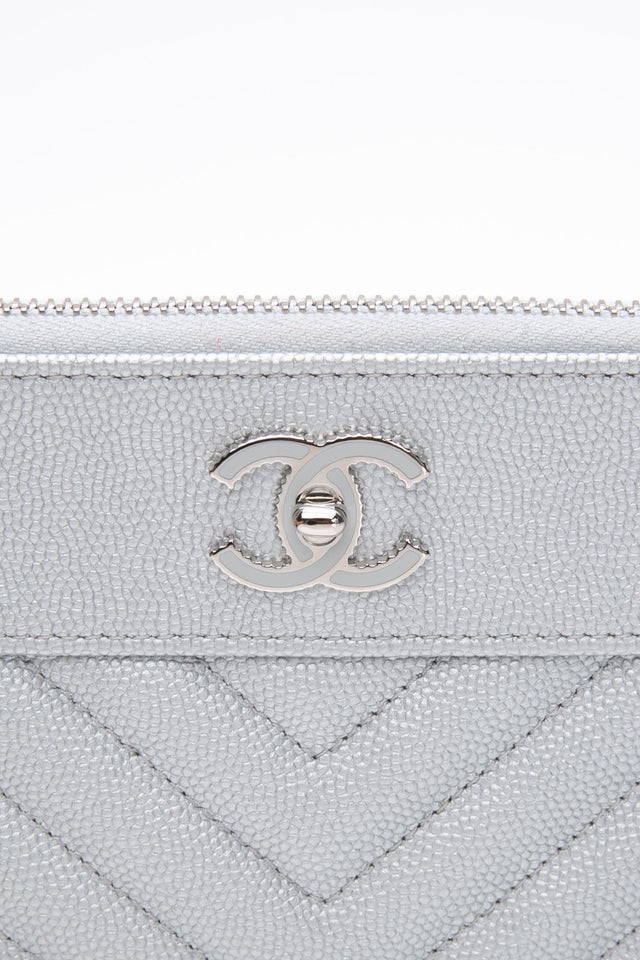 CHANEL Metallic Silver Caviar Chevron Quilted Small Mademoiselle Zip Pouch Case