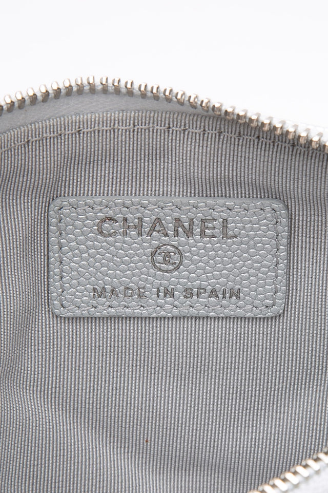 CHANEL Metallic Silver Caviar Chevron Quilted Small Mademoiselle Zip Pouch Case