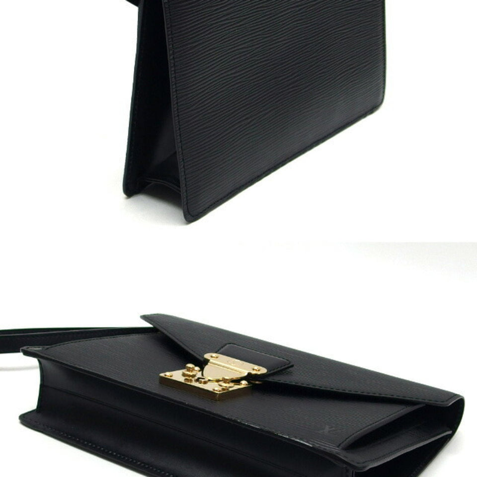 Louis Vuitton Sellier  Leather Clutch Bag