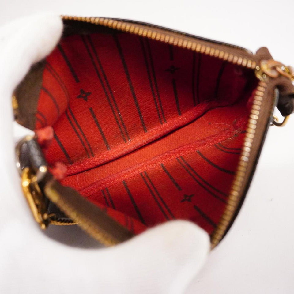 Louis Vuitton Mini Pochette Accessoires  Canvas Clutch Bag