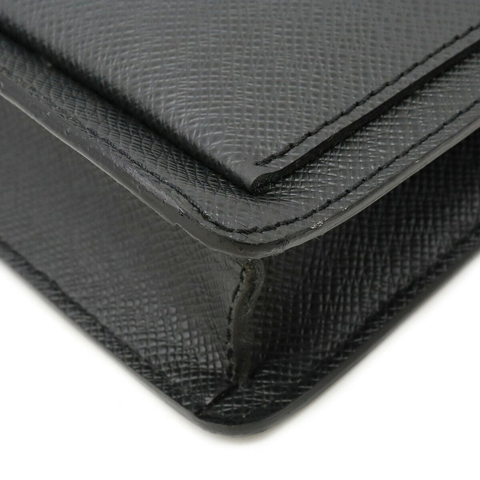 Louis Vuitton Berea  Leather Clutch Bag