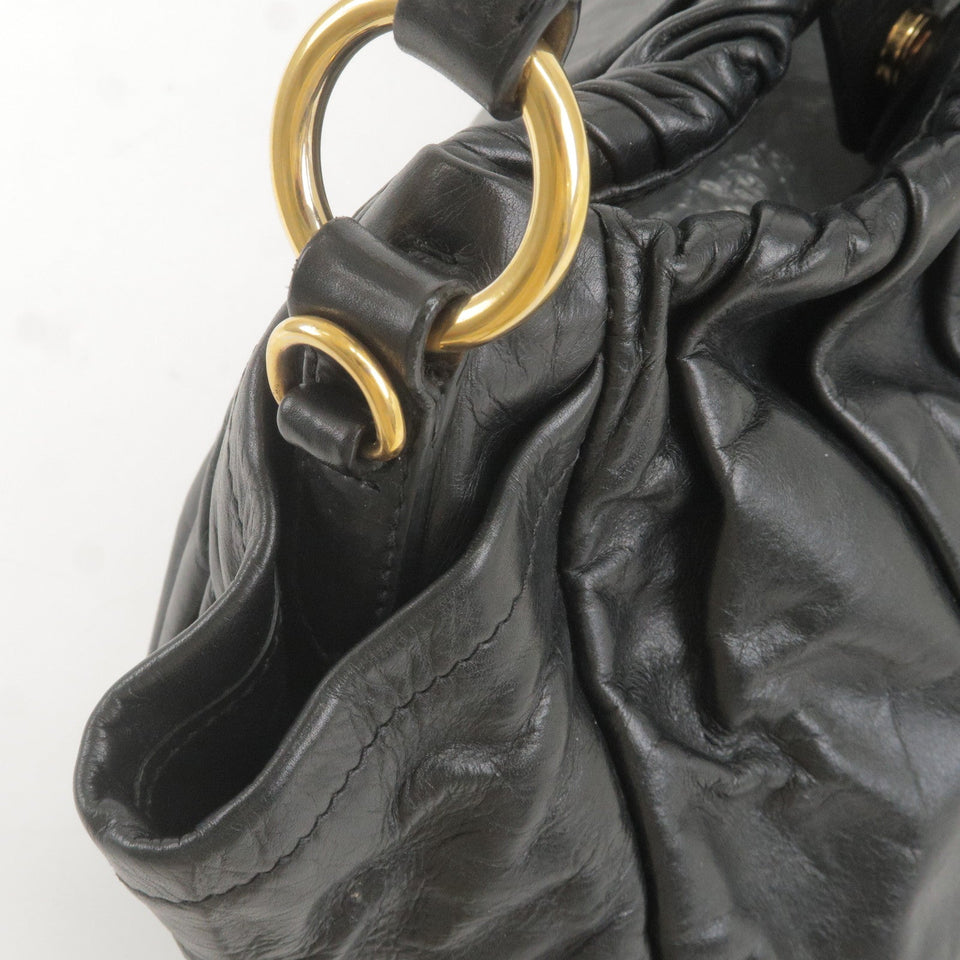 Prada Logo Leather Shoulder Bag With Tassel Black