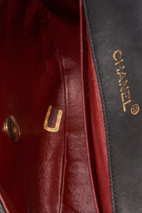 Vintage Chanel Black Half Moon Single Flap with 24k gold plated hardware