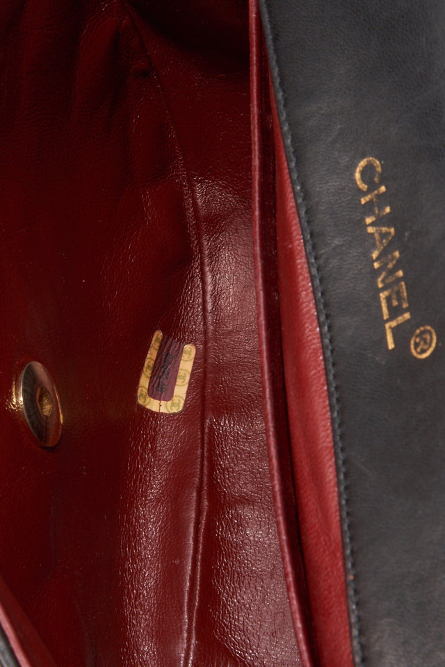 Vintage Chanel Black Half Moon Single Flap with 24k gold plated hardware
