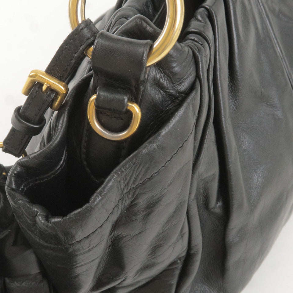 Prada Logo Leather Shoulder Bag With Tassel Black