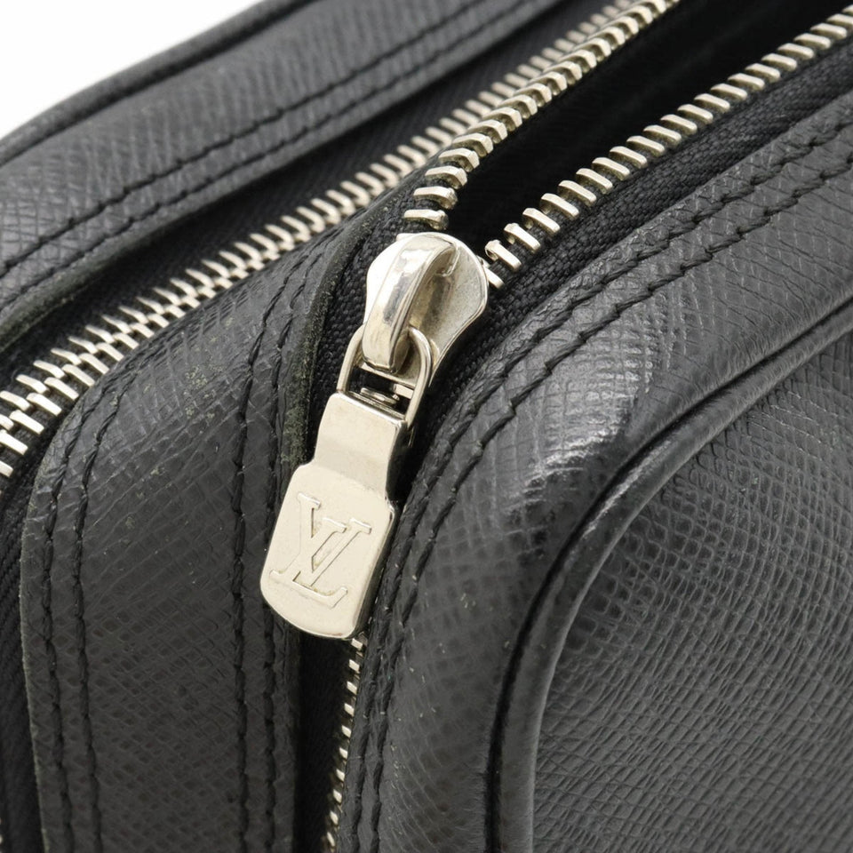 Louis Vuitton Pavel  Leather Clutch Bag