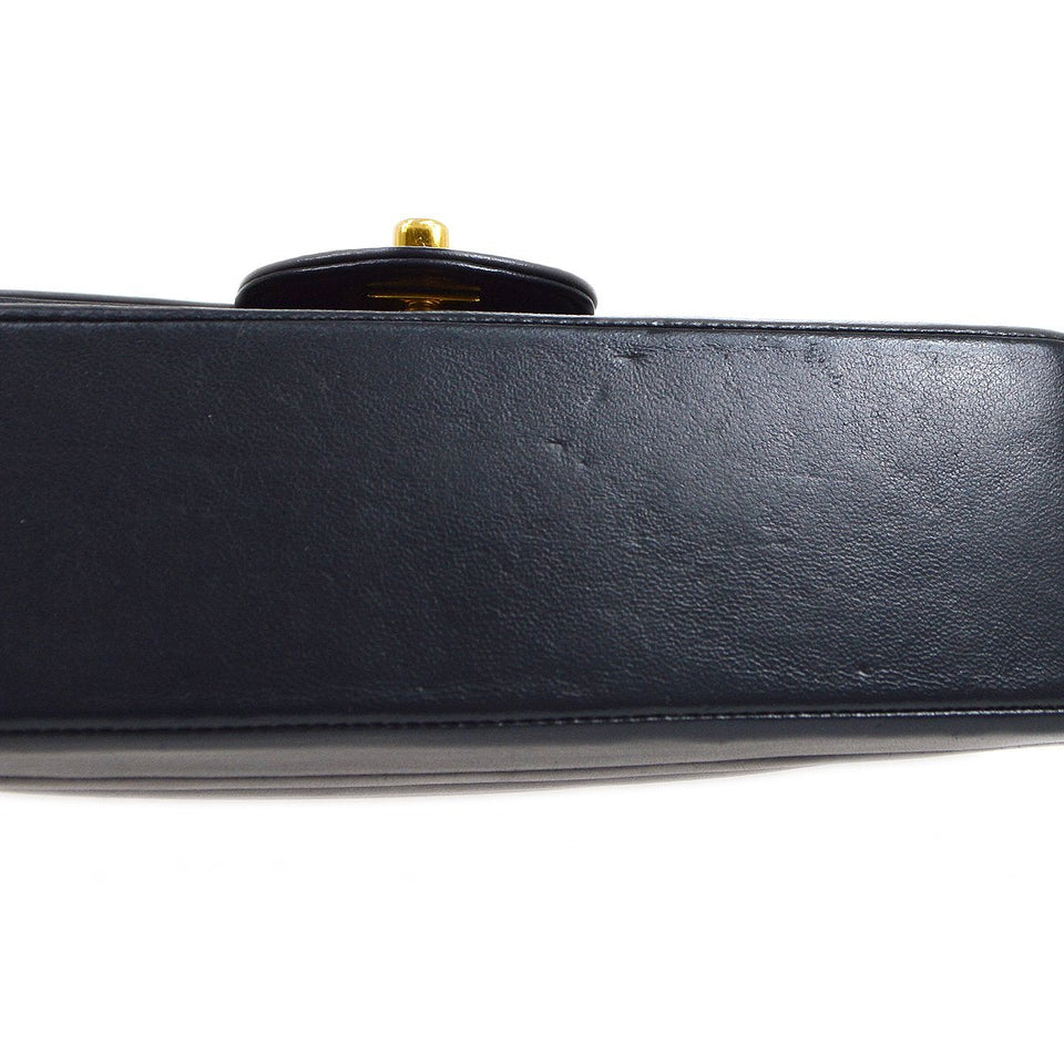 CHANEL 1991-1994 Vertical Flap Small Navy Lmabskin