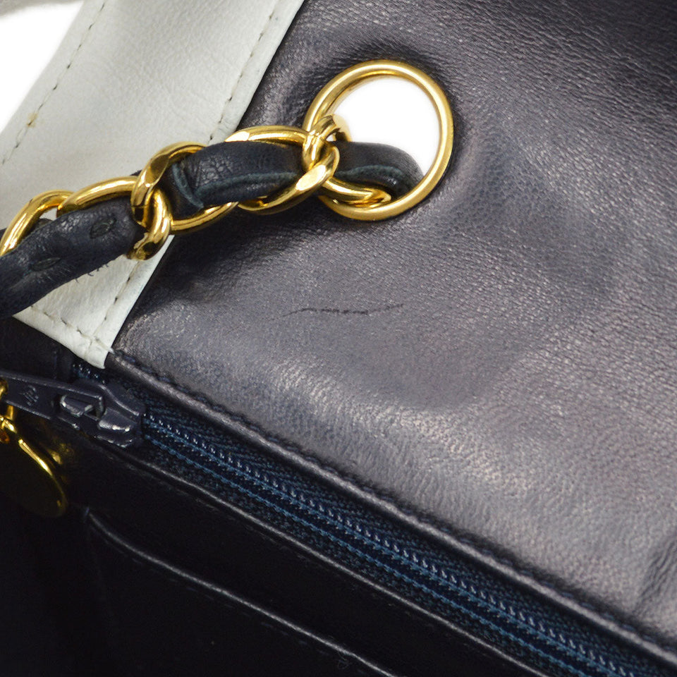CHANEL 1991-1994 Vertical Border Flap Mini Navy Lambskin