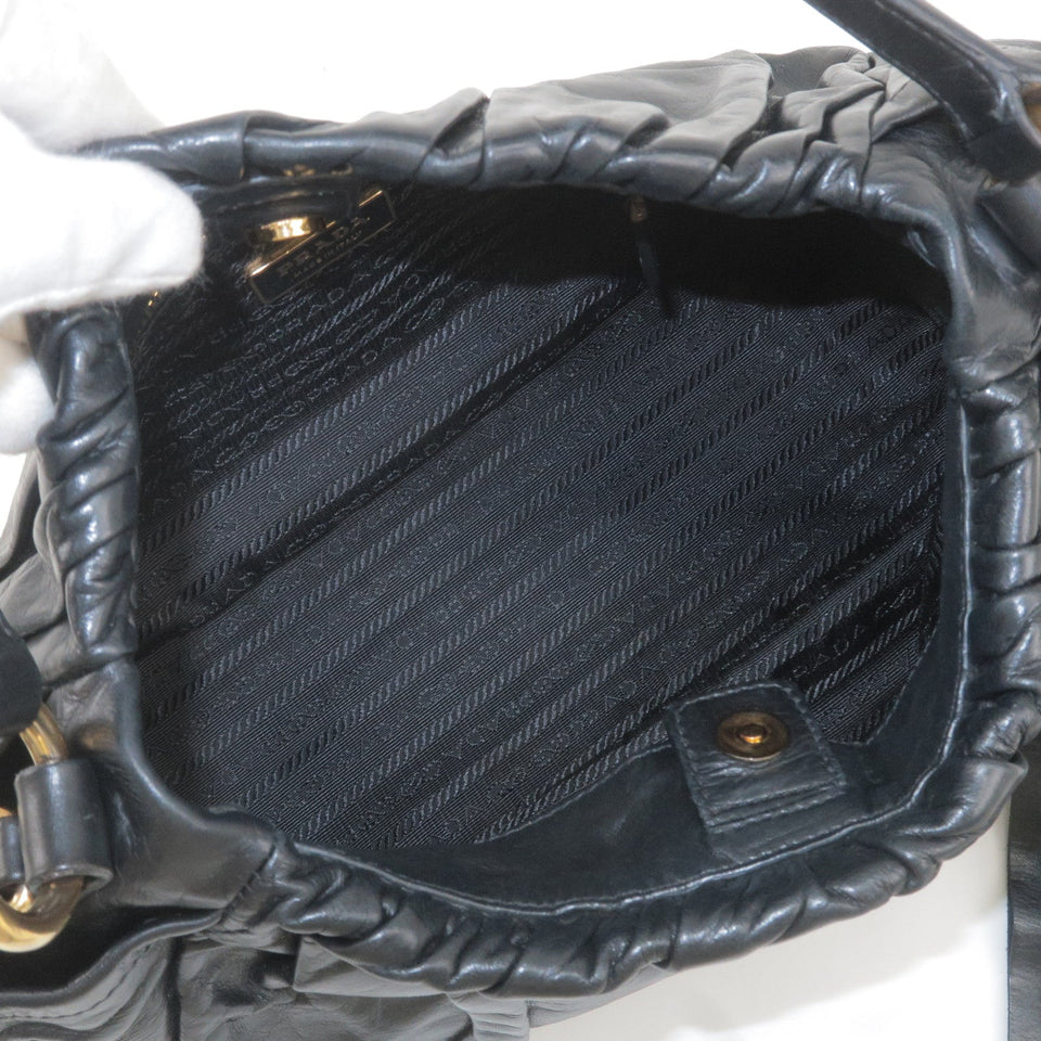 Prada Logo Leather Shoulder Bag With Tassel Black