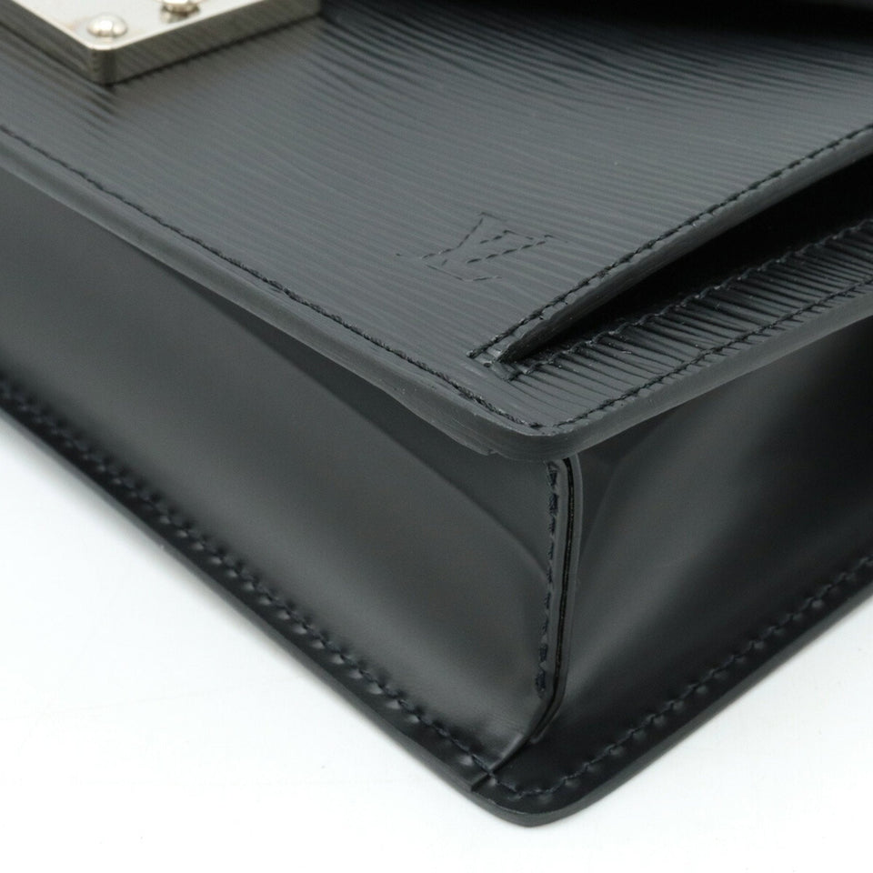 Louis Vuitton Sellier Drangonne  Leather Clutch Bag