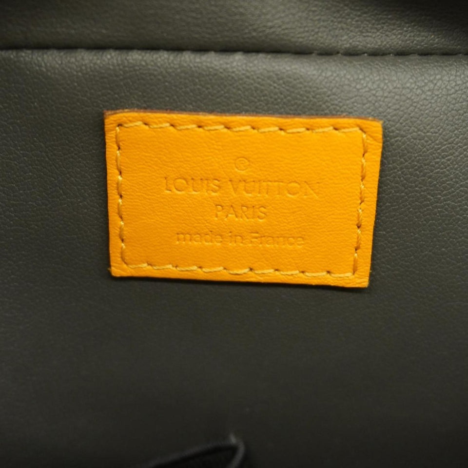 Louis Vuitton Trousse De Toilette  Leather Clutch Bag