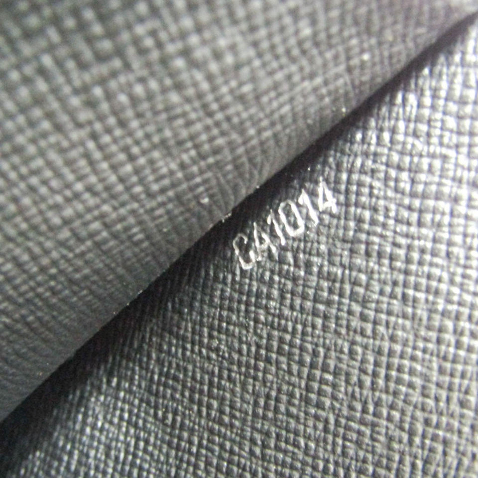 Louis Vuitton Selenga  Leather Clutch Bag
