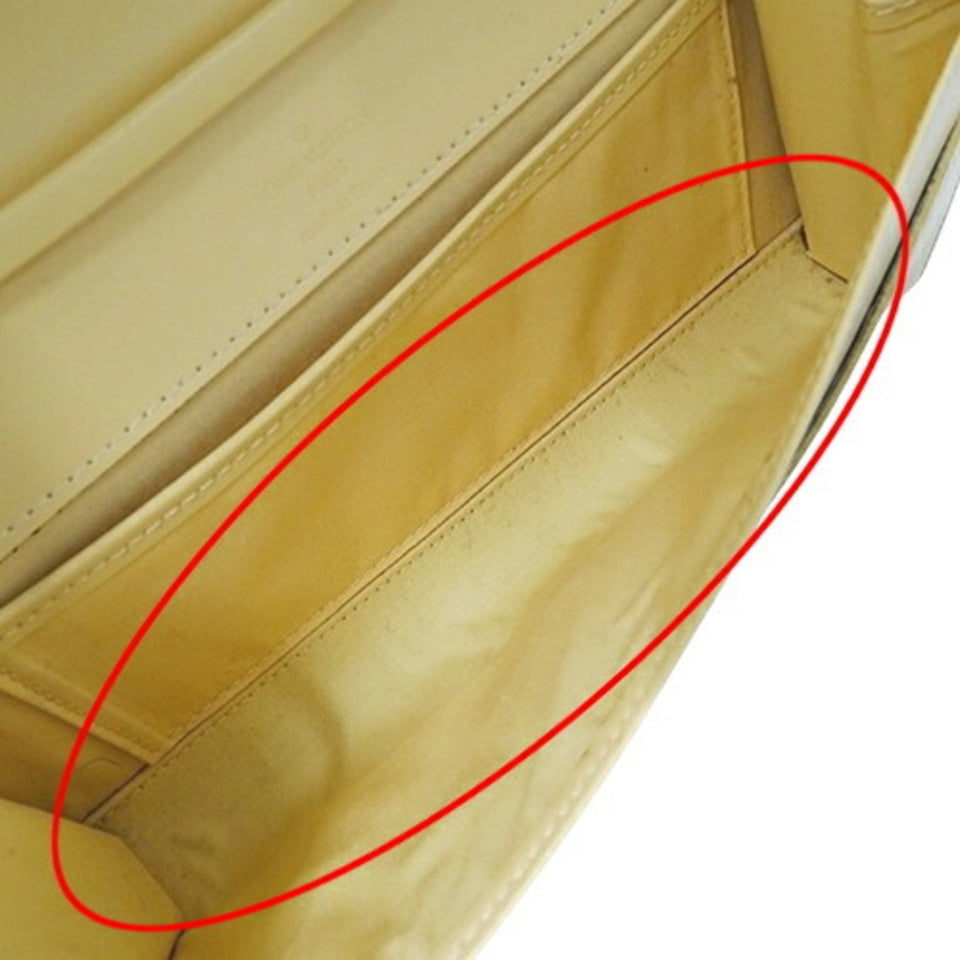 Louis Vuitton Honfleur  Leather Clutch Bag