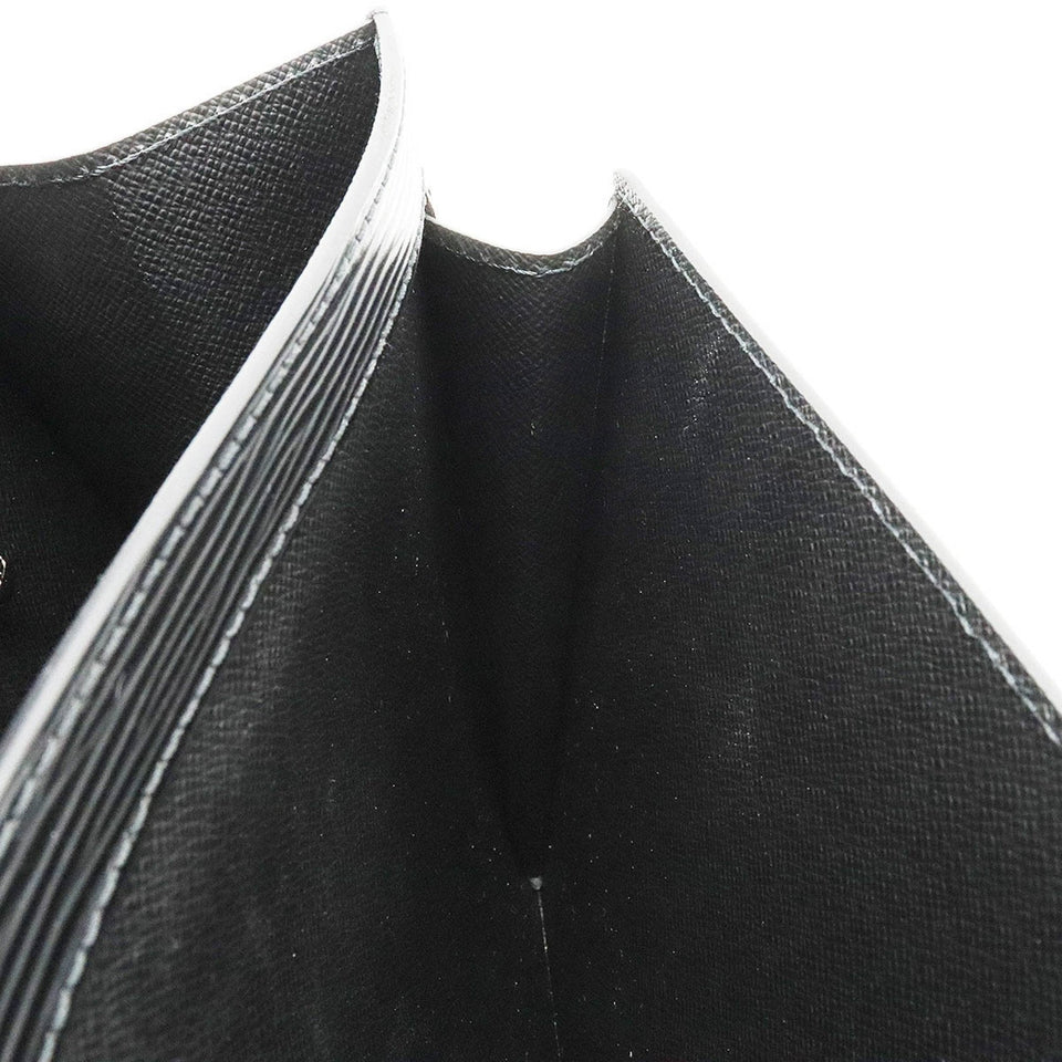 Louis Vuitton Sellier Drangonne  Leather Clutch Bag