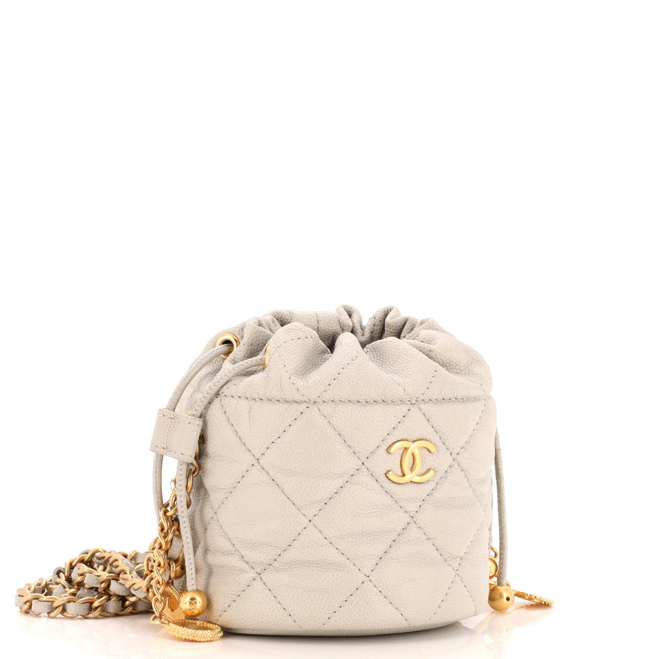 Medallion Charms Drawstring Bucket Bag Quilted Caviar Mini