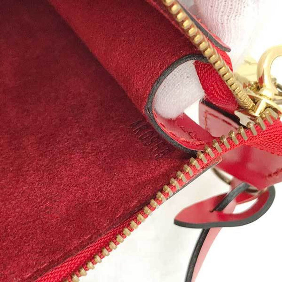 Louis Vuitton Pochette Accessoires  Leather Clutch Bag