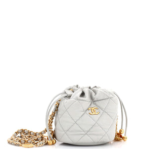 Medallion Charms Drawstring Bucket Bag Quilted Caviar Mini