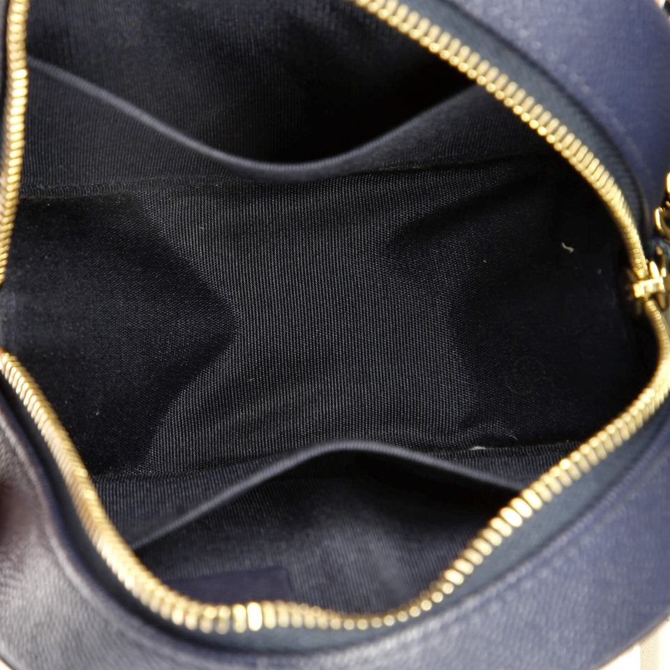 Filigree Round Clutch with Chain Quilted Caviar Mini