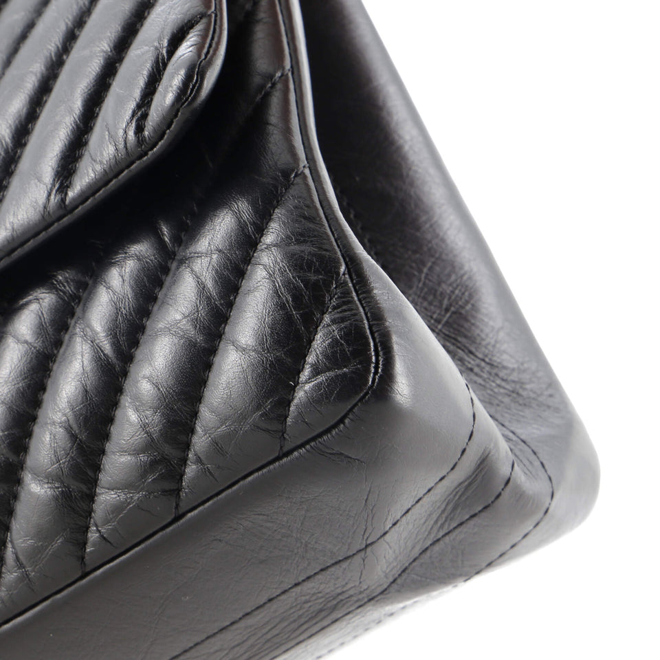 So Black Reissue 2.55 Flap Bag Chevron Aged Calfskin 226