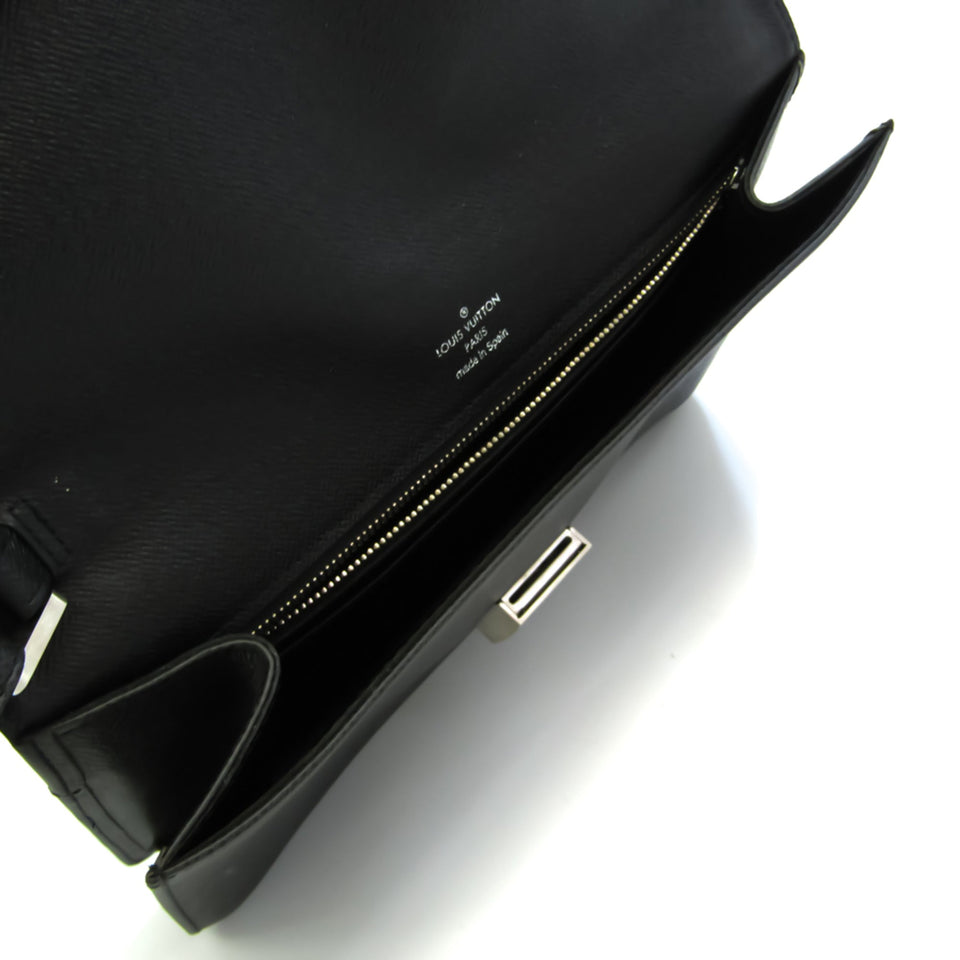 Louis Vuitton Selenga Leather Clutch Bag