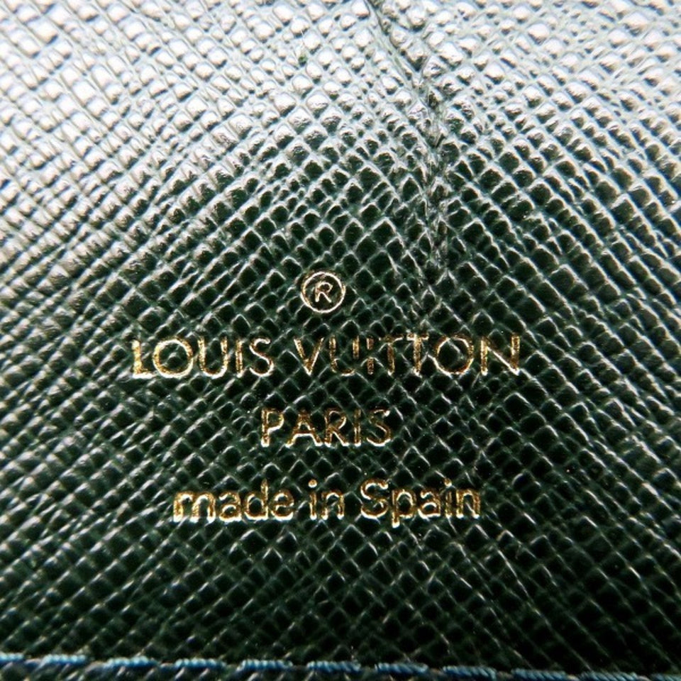 Louis Vuitton Selenga  Leather Clutch Bag