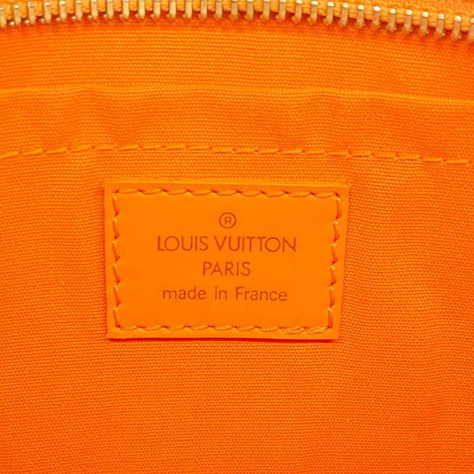 Louis Vuitton Sarvanga  Leather Clutch Bag