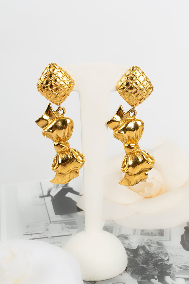 Boucles d'oreilles dorées Chanel