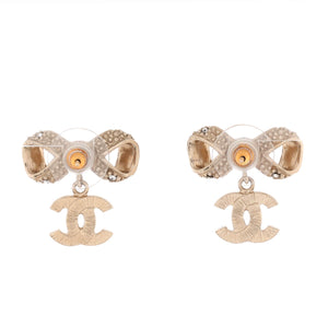 CC Bow Stud Earrings Metal with Crystals