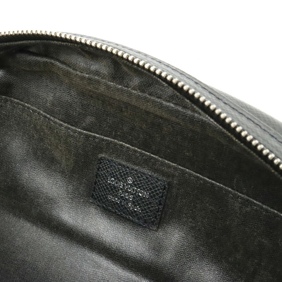 Louis Vuitton Trousse Ivan  Leather Clutch Bag