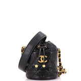Twist Your Buttons Drawstring Bucket Bag Quilted Caviar Mini