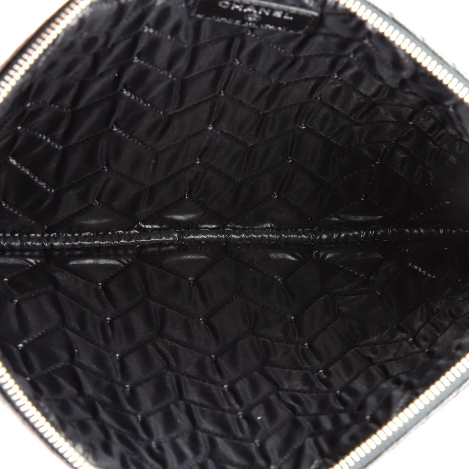 O Case Clutch Chevron Caviar Medium