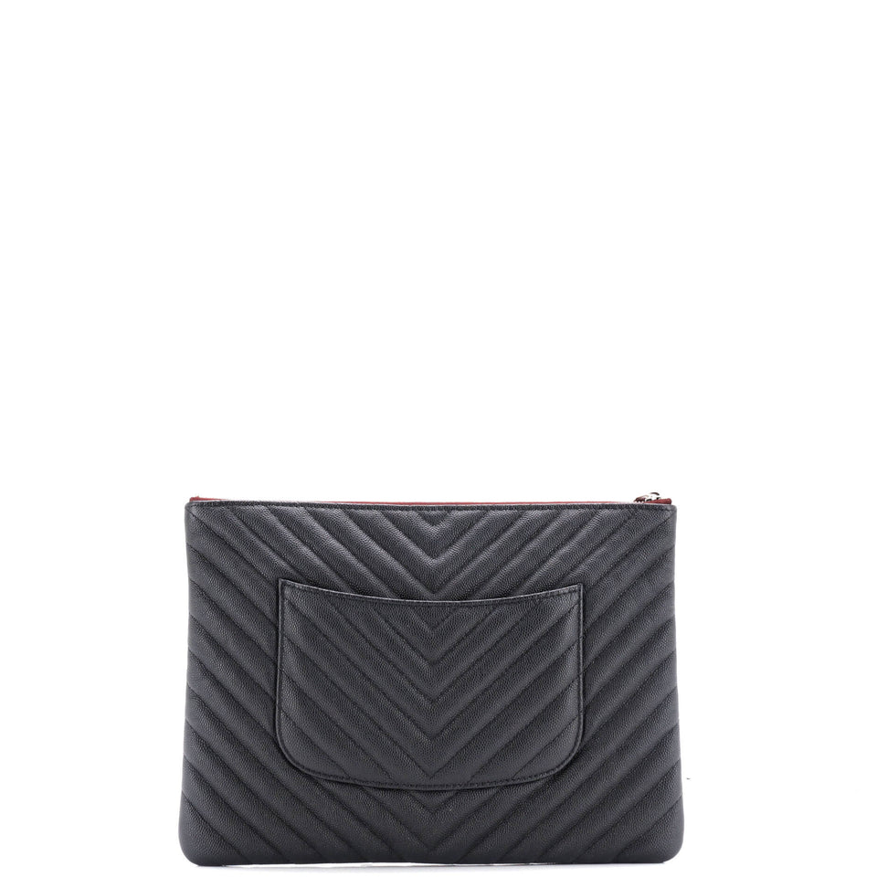O Case Clutch Chevron Caviar Medium