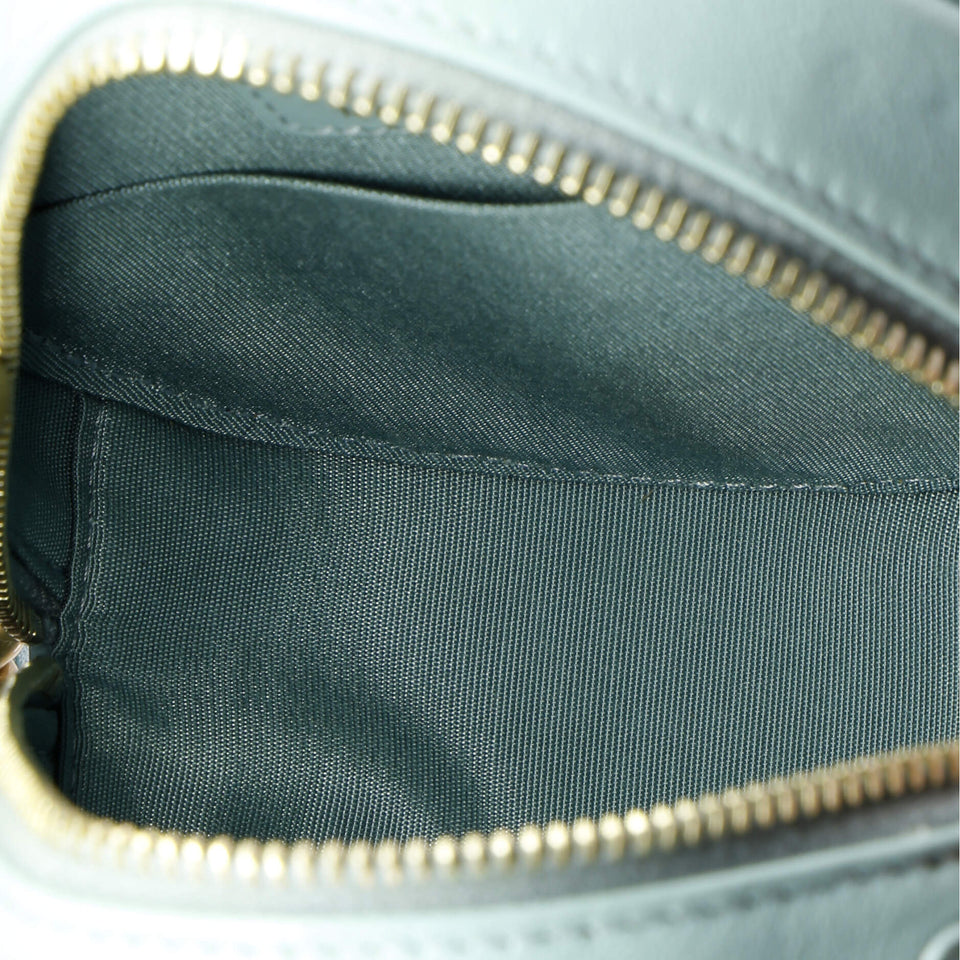 19 Round Clutch with Chain Quilted Leather